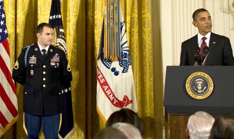 President Barack Obama presents the Medal of Honor to Staff Sgt. Salvatore Giunta in the East Room of the White House, November 16, 2010, for his actions of valor during an enemy attack in the Korengal Valley of Afghanistan, Oct. 2007. (Photo Credit: U.S. Army)