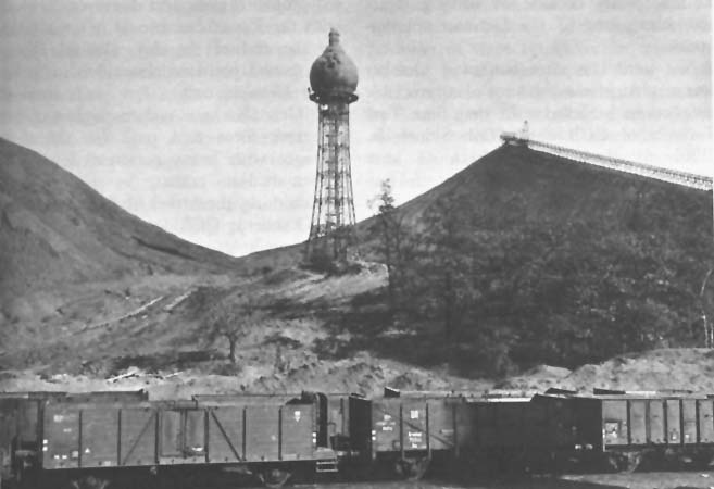 Photo: Slag Pile and Tower used by Germans for observation in Uebach.