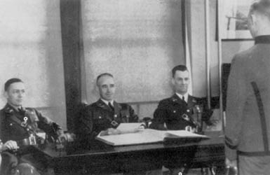 Lt. Col. Omar Bradley (center) and members of the Tactics Department at West Point, 1937.