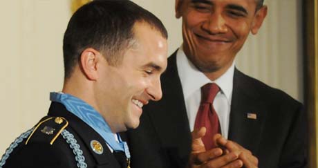 President Barack Obama applauds Staff Sgt. Salvatore Giunta in the East Room of the White House, November 16, 2010, after presenting the Medal of Honor to him for his actions of valor during an enemy attack in the Korengal Valley of Afghanistan. (Photo Credit: U.S. Army)