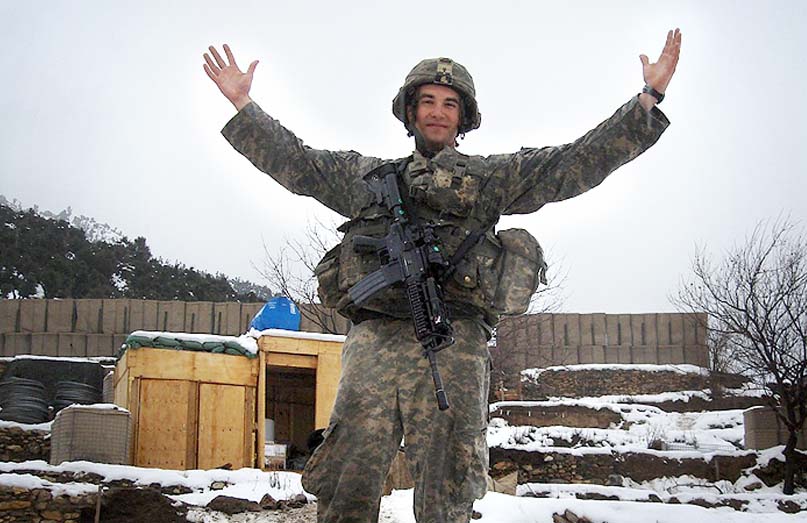Now-Staff Sgt. Salvatore Giunta shows off “home” during his 15-month deployment to Afghanistan in 2007-2008. He and the other members of 1st Platoon, Battle Company, 173rd Airborne Brigade Combat Team, expanded Firebase Vegas, on a remote mountaintop.