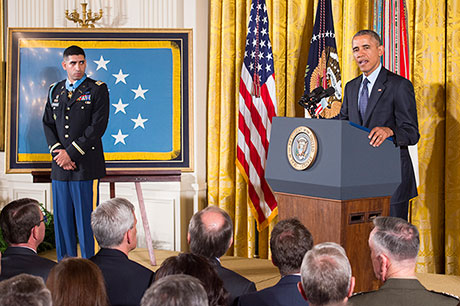 President Barack Obama hosts the Medal of Honor Ceremony for retired U.S. Army Capt. Florent Groberg at the White House in Washington D.C., Nov. 12, 2015. Groberg received the medal for actions during a combat engagement in Kunar province, Afghanistan, Aug. 8, 2012 while he was the commander of a personal security detail for the 4th Brigade Combat Team, 4th Infantry Division, when he and another Soldier, Sgt. Andrew Mahoney, identified and tackled a suicide bomber, saving the lives of the brigade commander and several others. (U.S. Army photo by Eboni L. Everson-Myart)