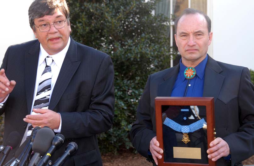 Kurt Bluedog and Russell Hawkins respond to questions from the media outside the White House on March 3, 2008, following a Medal of Honor presentation ceremony. The men accepted the medal from the president on behalf of Master Sgt. Woodrow Wilson Keeble. U.S. Army photo.