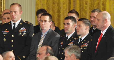 President Barack Obama praises Army veteran Staff Sgt. Clinton Romeshas team mates before he presents the Medal of Honor. (Photo Credit: U.S. Army)