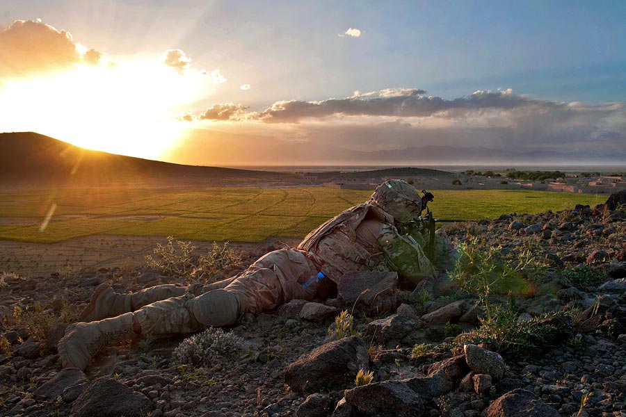 Paratrooper with 82nd Airborne Division, provides overwatch security after firefight