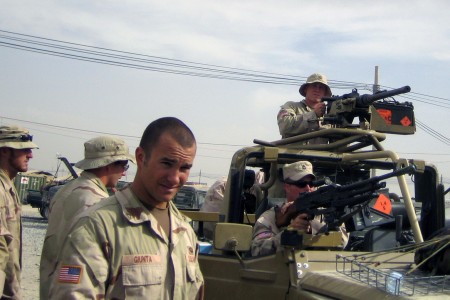 Salvatore Giunta in front of army vehicle