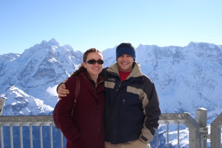 Staff Sergeant Giunta and his wife standing in front of snow covered mountains