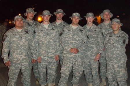 Salvatore Giunta at night with other Soldiers