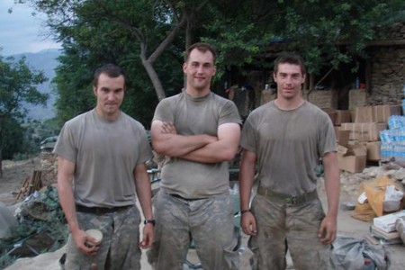 Salvatore Giunta with two other Soldiers in camp