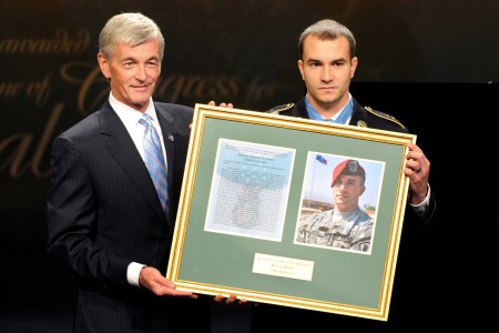 Staff Sergeant Salvatore Giunta with framed citation