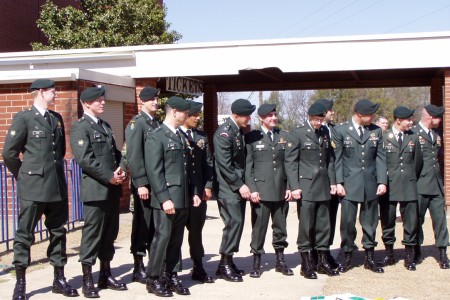 Soldiers standing in line in their dress greens
