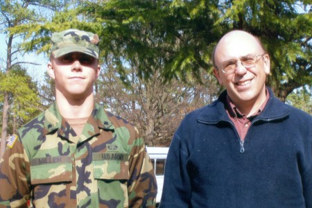 Staff Sergeant Robert Miller standing with his father