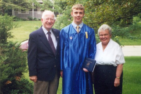 At graduation with his grand parents