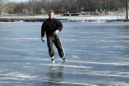 Staff Sergeant Robert Miller ice skating on a pond or stream