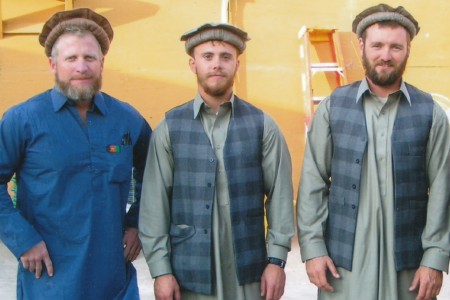 Three Soldiers in local Afghanistan clothes