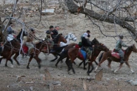 Group of Soldiers and otehrs riding horses