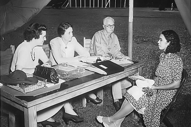 Mary Adair (right) takes an examination at Fort McPherson June 20, 1942, for entrance into the Women's Army Auxiliary Corps (WAAC) Officers Candidate School. Fort McPherson has seens its share of evolution in the Army in its 126 year existence, serving Soldiers in the Spanish-American War, both World Wars, Korea and Vietnam among other conflicts. Times have changed a great deal since the post first opened its gates in 1885, with changes such as the creation of the WAAC and its integration into the regular Army.
