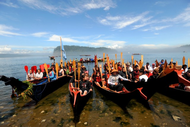 Western Native American tribes join annual canoe journey across Puget 