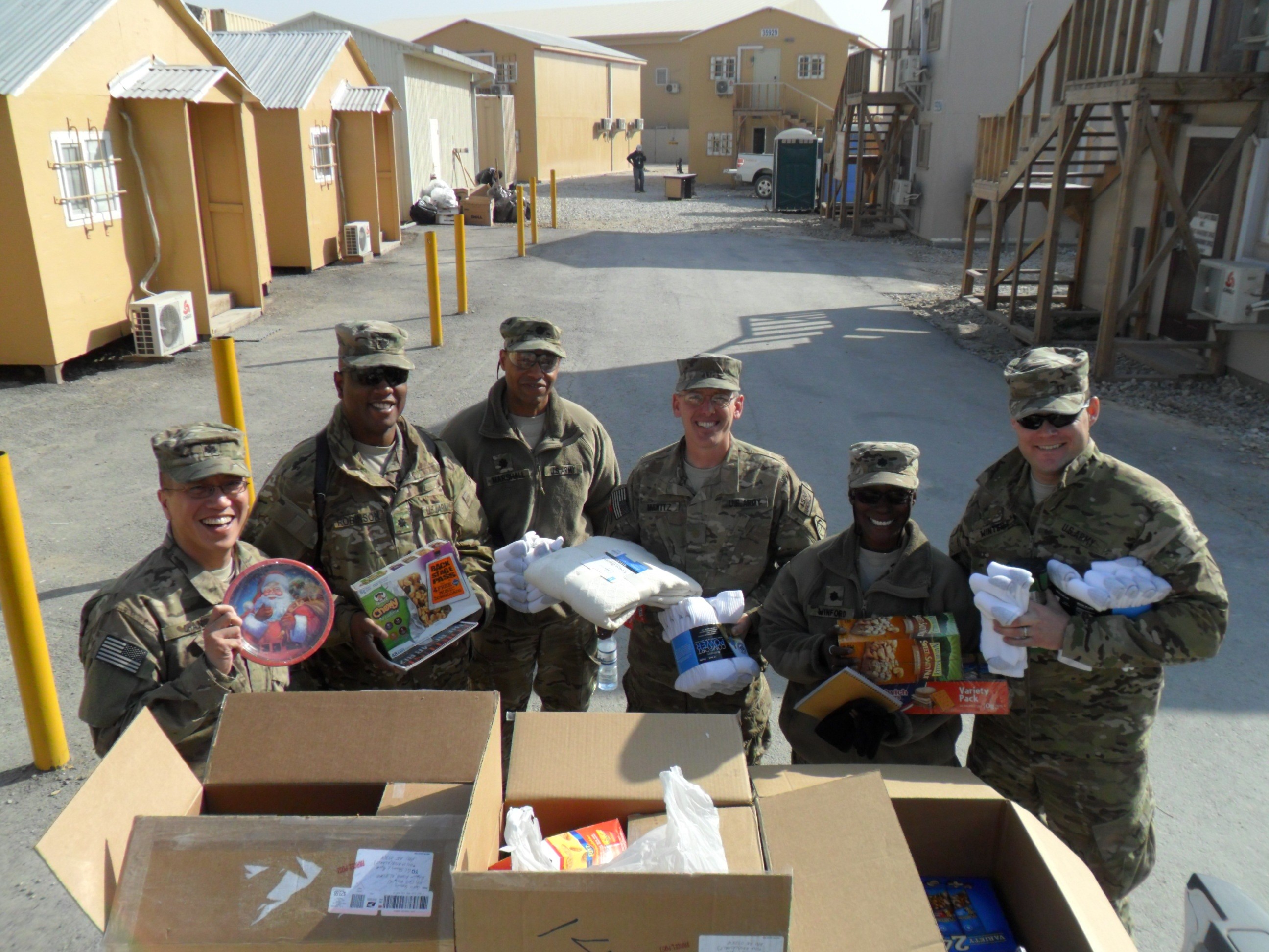 Contracting workers send care packages to troops | Article | The United States Army How To Send A Package To Afghanistan