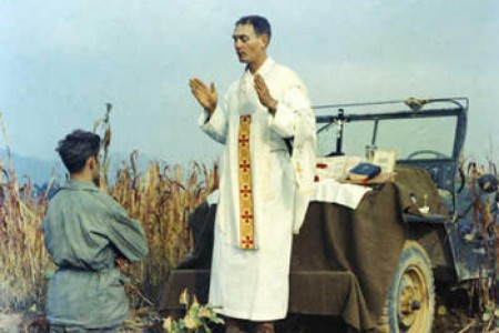 Father Kapaun celebrating mass jeepside