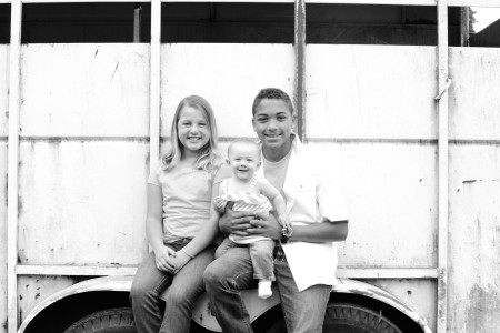 Staff Sgt. Ty Carter’s children, daughter Madison, daughter Sehara, and son Jayden on their family farm in Yelm, Wash., July, 2013.