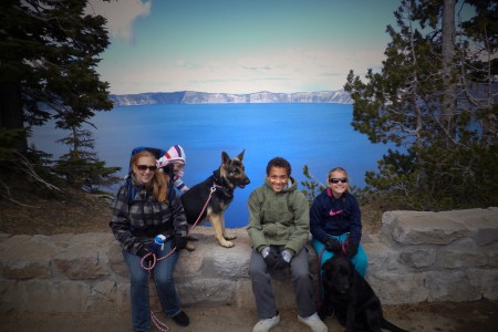 Staff Sgt. Ty Carter’s wife Shannon, his daughter Sehara, his son Jayden, and his daughter Madison, along with family dogs Nala and Karma, pause for a photo along the rim of Crater Lake, Ore., during a family vacation, June 2013.