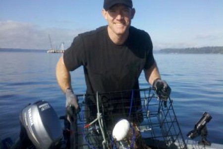 Sgt. Ty Carter goes crabbing for the first time, on South Puget Sound in 2011.