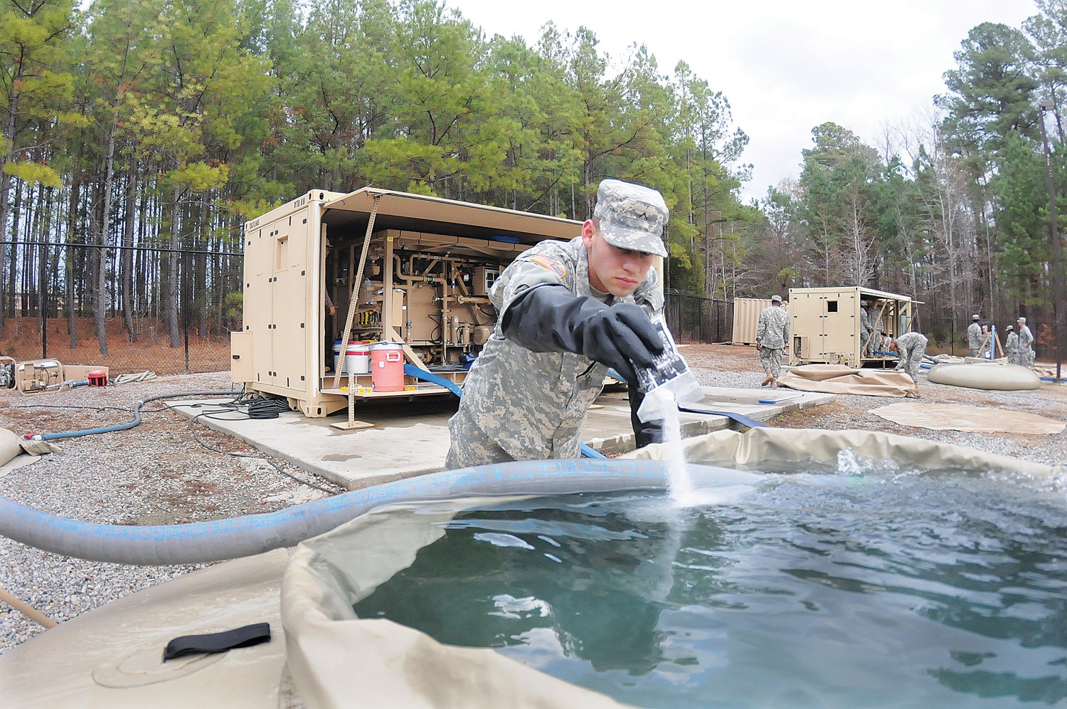 Flowing water treatment specialist students train on tactical