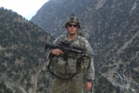Sgt. Ryan Pitts, with Chosen Company, takes a break from building a traffic control point northeast of Combat Outpost Bella, Afghanistan, spring 2008. The traffic control point was on the road from COP Bella to Aranas, Afghanistan.