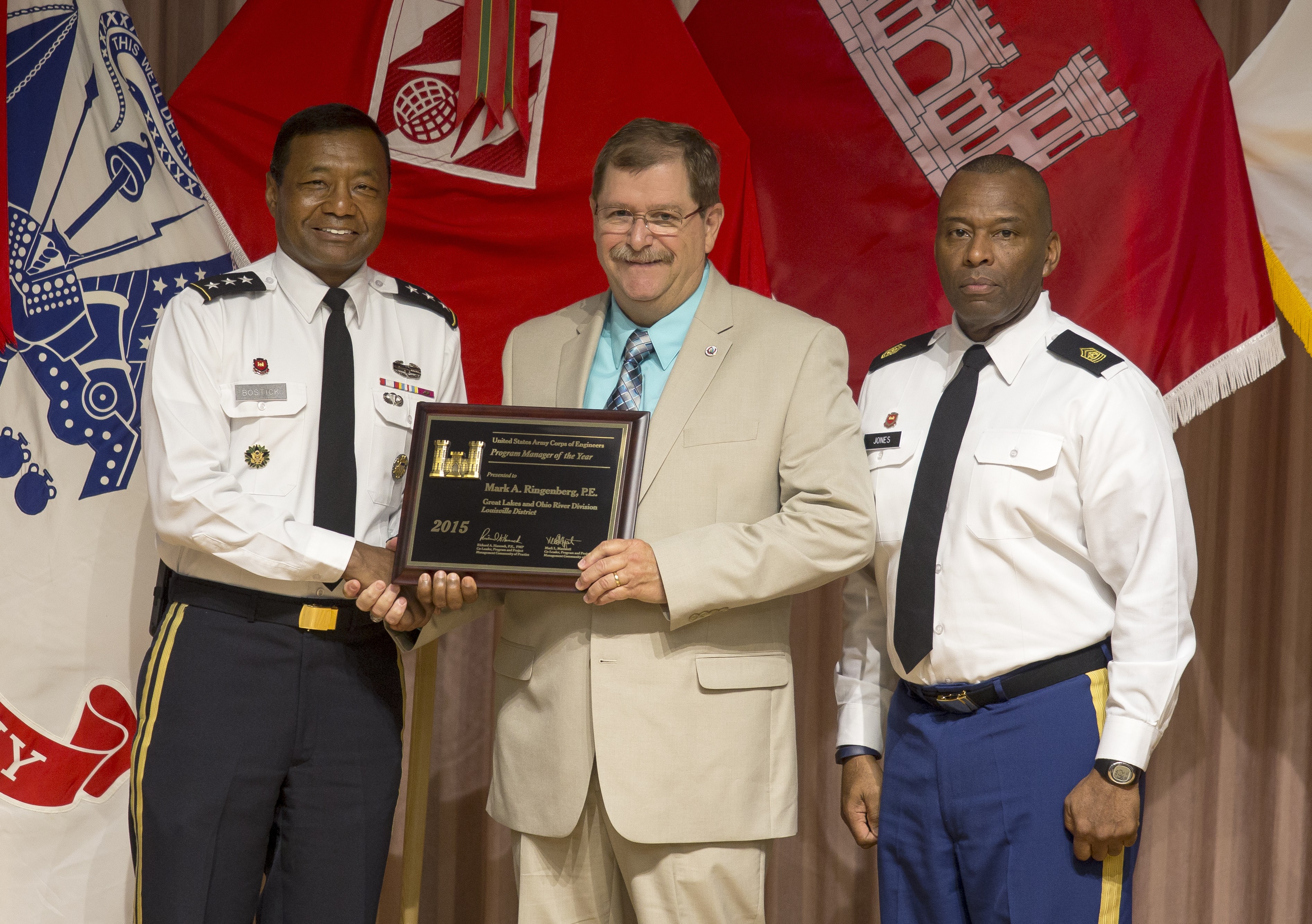Louisville District Army Corps of Engineers Mark Ringenberg receives