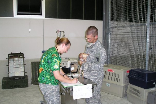 Then-Capt. Kristina McElroy in-processing newly-arrived pets in Vilseck, Germany, in 2006.