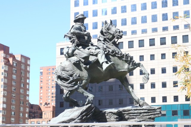 The America's Response Monument, aka Horse Soldier statue, sits in its final resting place at Liberty Park, adjacent to the 9/11 Memorial in New York City. The statue serves as a reminder of the bond formed between U.S. Special Operations Forces and the New York City first responders. (U.S. Army photo by Capt. Eric Hudson, 160th SOAR Public Affairs.)