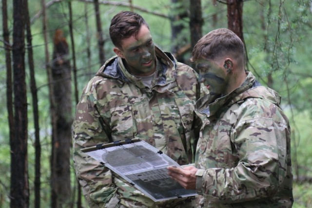 Cadet Nate Librizzi, left, a U.S. Military Academy student and Mount Pleasant-Charleston, South Carolina, native, discusses the operations order for an upcoming platoon live-fire exercise with 1st Lt. Timothy Goldstone, his sponsor and a platoon leader with Chaos Company, 1st Battalion, 68th Armor Regiment, 3rd Armored Brigade Combat Team, 4th Infantry Division, at Grafenwoehr Training Area, Germany, July 26, 2017. West Point cadets are spending three weeks in Germany training with the Iron Brigade as it hones readiness in support of Operation Atlantic Resolve. (Photo by Staff Sgt. Ange Desinor, 3rd Armored Brigade Combat Team, 4th Infantry Division)