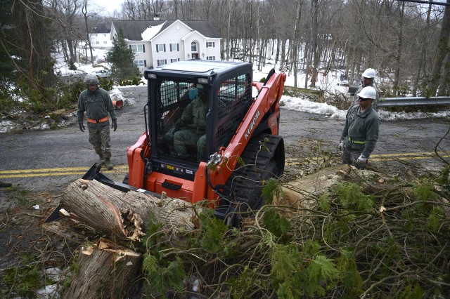 Twenty Airmen assigned to the 105th Airlift Wing deployed to Putnam County, New York, to help town and county workers clear debris from roadways. The county was hit hard with a winter storm knocking down trees and causing widespread power outages. 