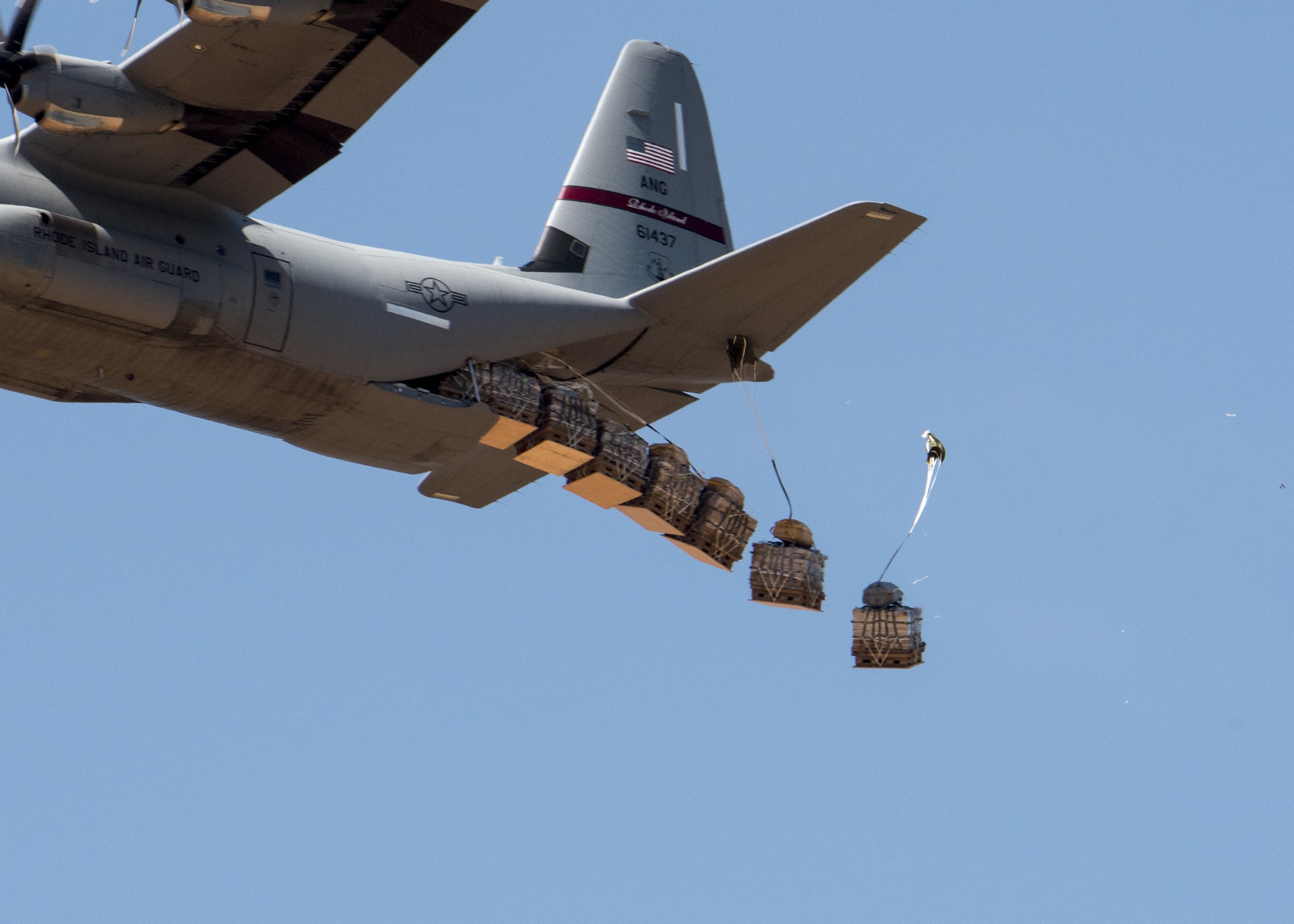 Airborne testers conduct airdrop tests of new container delivery system