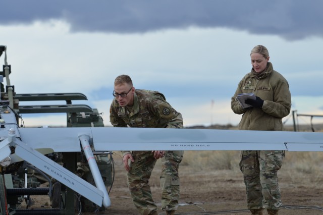 Idaho Army National Guard Sgt. Mellissa Baney and Spc. Scott Post conduct a pre-flight inspection of a D Company, 116th Brigade Engineer Battalion Shadow Jan. 17, 2019 at the Orchard Combat Training Center. Baney, a 15W unmanned aircraft systems operator, previously served in the U.S. Army before joining the Idaho Army National Guard to help pay for law school.