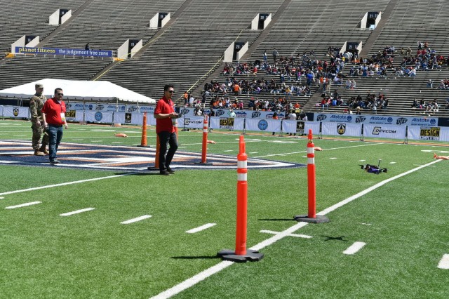 An undergraduate student from the University of Illinois Chicago maneuvers a  small unmanned aerial vehicle through the course during the U.S. Army's inaugural HBCU/MI Design Competition held at the University of Texas at El Paso's Sun Bowl Stadium April 23-24, 2019.The competition, led by the U.S. Army Combat Capabilities Development Command, challenged 11 undergraduate student teams from historically black colleges and universities and other minority serving institutions (HBCUs/MIs) to develop solutions to real-world technical challenges faced by U.S. Army researchers in the area of unmanned aerial vehicles, commonly called drones.