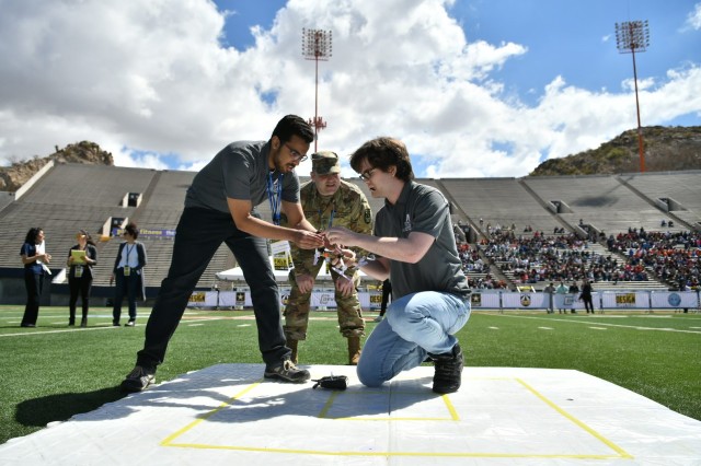 Undergraduate students from the University of Texas at Arlington prepare their unmanned aerial vehicle for a flight demonstration as part of the U.S. Army's inaugural HBCU/MI Design Competition held at the University of Texas at El Paso's Sun Bowl Stadium April 23-24, 2019.The competition, led by the U.S. Army Combat Capabilities Development Command, challenged 11 undergraduate student teams from historically black colleges and universities and other minority serving institutions (HBCUs/MIs) to develop solutions to real-world technical challenges faced by U.S. Army researchers in the area of unmanned aerial vehicles, commonly called drones.