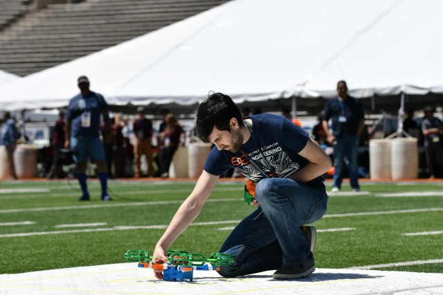 An undergraduate student from the University of Texas at San Antonio inspects his team's unmanned aerial vehicle during a flight demonstration as part of the U.S. Army's inaugural HBCU/MI Design Competition held at the University of Texas at El Paso's Sun Bowl Stadium April 23-24, 2019.The competition, led by the U.S. Army Combat Capabilities Development Command, challenged 11 undergraduate student teams from historically black colleges and universities and other minority serving institutions (HBCUs/MIs) to develop solutions to real-world technical challenges faced by U.S. Army researchers in the area of unmanned aerial vehicles, commonly called drones.