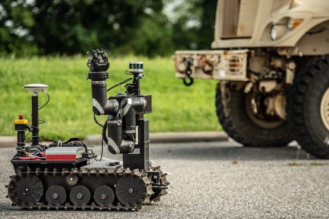 RoMan, short for Robotic Manipulator, is a tracked robot with arms and hands -- necessary appendages to remove heavy objects and other road debris from military vehicles' paths.