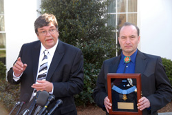 Kurt Bluedog and Russell Hawkins respond to questions from the media outside the White House