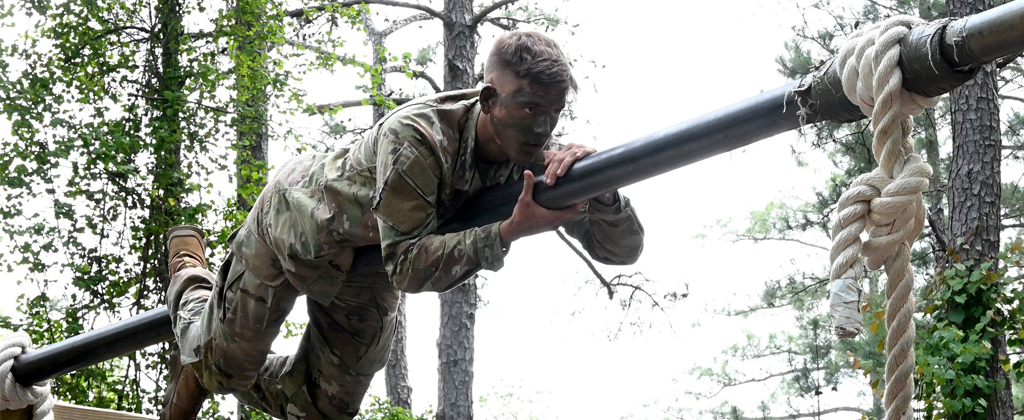 Soldier traverses obstacle