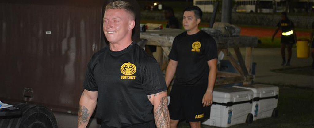 Soldier lifts weights
