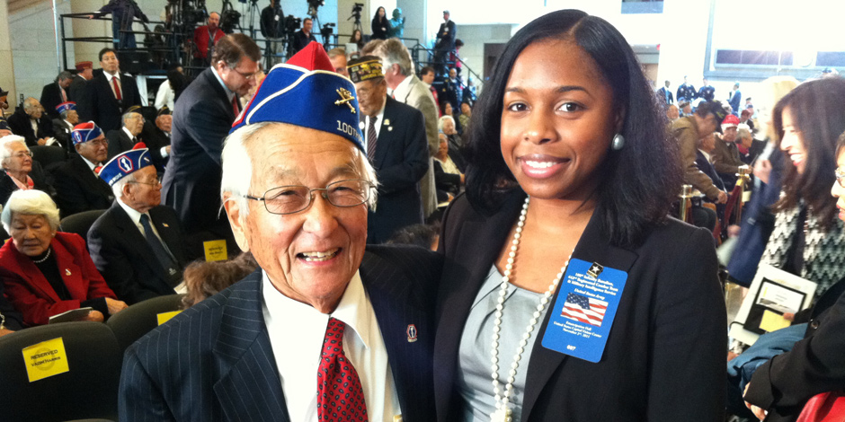 Department of Army Intern, Brittany Walker, posing with retired Asian American Soldier
