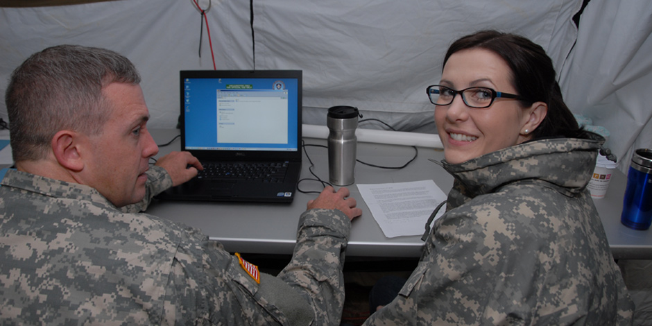 Department of Army Intern, Susan Anderson, doing audio interview with Soldier