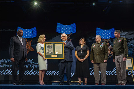 Secretary of the Army Christine Wormuth presents a photo and citation to Medal of Honor recipient
former Army Spc. Five Dwight W. Birdwell, in a ceremony in which Birdwell and five others were
inducted into the Pentagon Hall of Heroes, at Joint Base Myer-Henderson Hall, Va., July 6, 2022. (U.S.
Army photo by Sgt. Henry Villarama)
