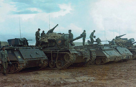 Soldiers assigned to the 3rd Cavalry Regiment, 4th Cavalry Division conduct maintenance on their vehicles
after a monsoon while deployed to Vietnam 1968. (Photo courtesy of Dwight Birdwell)