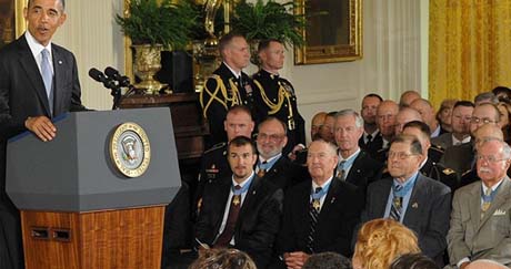 President Barack Obama cites the courage of Staff Sgt. Ty Carter with other Medal of Honor recipients in attendance at the Medal of Honor ceremony at the White House, Aug. 26, 2013. U.S. Army photo by Staff Sgt. Bernardo Fuller.