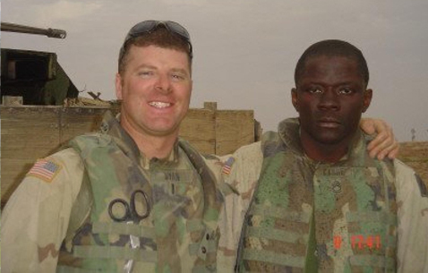 Then-1st Lt. James "Jimmy" Ryan, left, poses with Sgt. 1st Class Alwyn Cashe during their deployment to Forward Operating Base McKenzie in Samarra, Iraq. Ryan served as a platoon leader in Company A, 1st Battalion, 15th Infantry Regiment, where Cashe was his platoon sergeant. (Courtesy photo provided by Maj. James Ryan (Ret.))