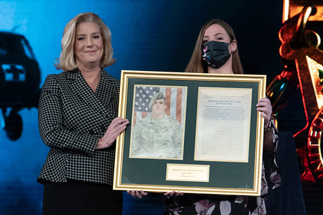 Secretary of the U.S. Army Christine E. Wormuth presents the Medal of Honor plaque to Katherine Celiz, spouse of U.S. Army Sgt. 1st Class Christopher A. Celiz, during a Medal of Honor Induction Ceremony at Joint Base Myer-Henderson Hall, Va., Dec. 17, 2021. Sgt. 1st Class Celiz was posthumously awarded the Medal of Honor for actions of valor during Operation Freedom’s Sentinel while serving as a battalion mortar platoon sergeant with Company D, 1st Battalion, 75th Ranger Regiment, in Paktiya province, Afghanistan, on July 12, 2018. (U.S. Army photo by Laura Buchta)
